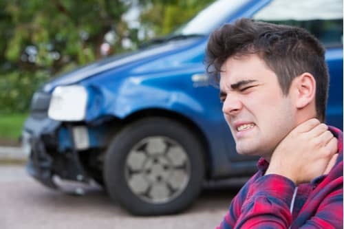 Young man with neck injury from car accident in Greenville South Carolina